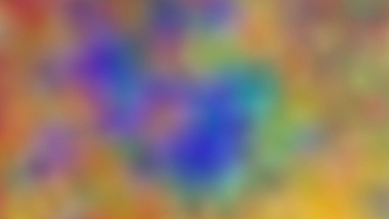 Loopable rotating abstract blurred background, dreamy defocused atmosphere, vivid colors in turbulent motion