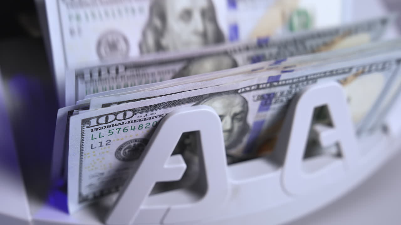 Money counting equipment for paper money calculation. Automatic mechanism for bank financial operations.