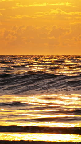 golden sunset reflection on ocean waves
