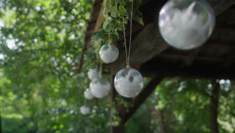 a beautiful wedding decor set in the midst of summer nature, offering a romantic and elegant ambiance with floral arrangements and natural elements.