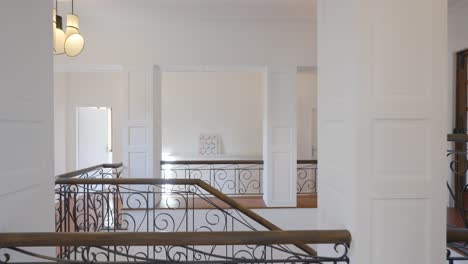 slow pull out shot of a modern staircase within a luxury villa in france