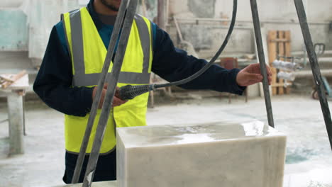 people working with marble