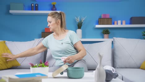 woman crying while cleaning.