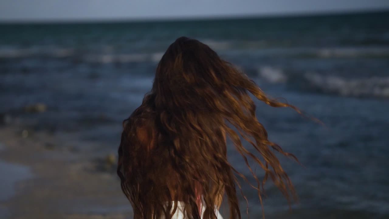 Portrait of a pretty young European model having fun at the beach on holidays.