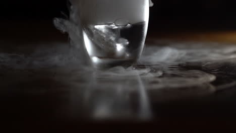 fog from water with dry ice in a glass