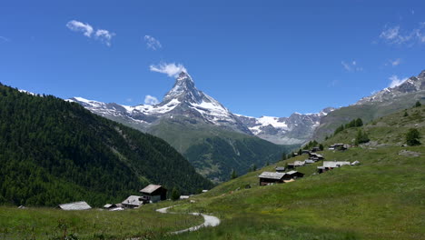 majestic landscape of the matterhorn summit partly covered in white snow during summer from the green meadow of findeln, zermatt, switzerland, europe - static shot