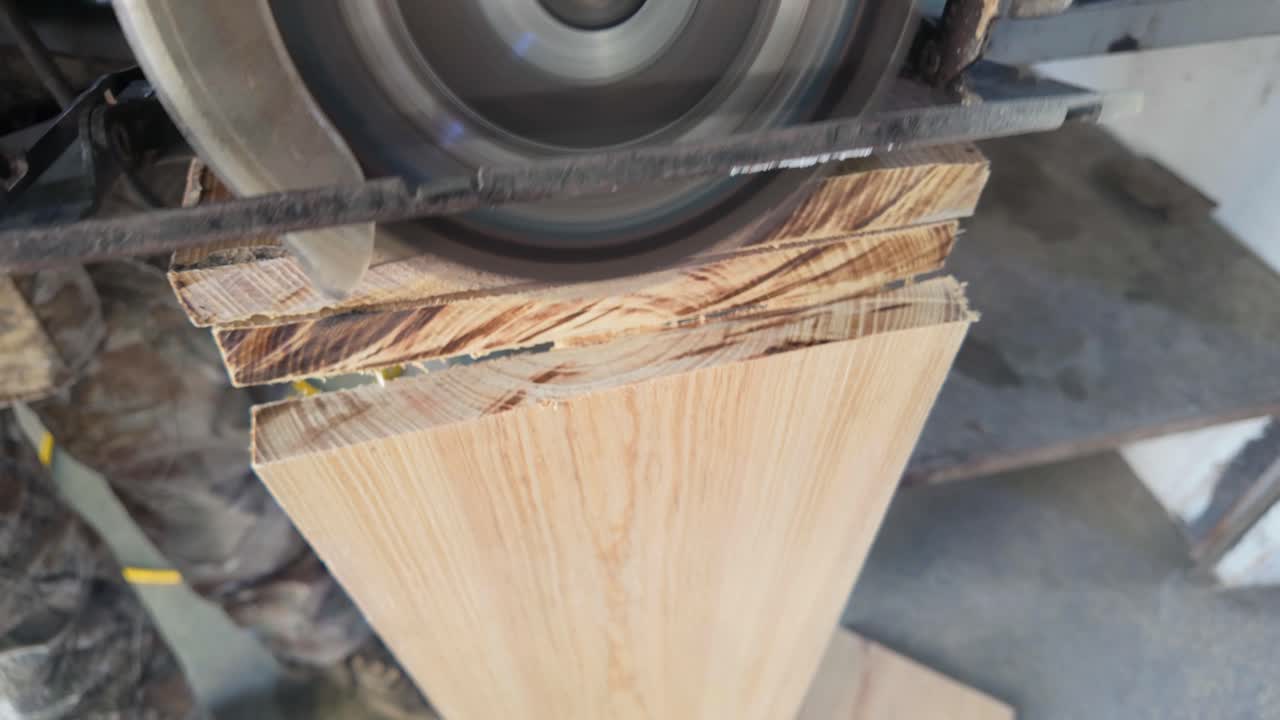 Circular saw blade cutting through a piece of wood. Use pinewood to make shelves