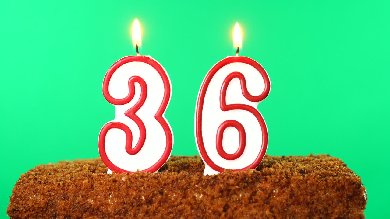 Cake with the number 36 lighted candle. Chroma key. Green Screen. Isolated