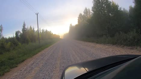 when driving a car, dust on the gravel road time lipse