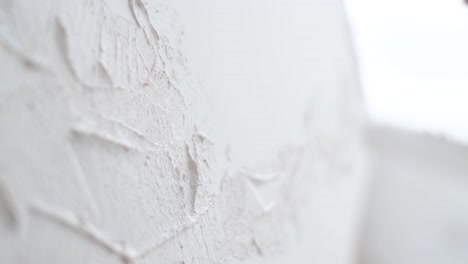 the talented artist enjoys the process of work he applies a plaster base to the future picture - the talented artist enjoys the process of work, he applies a plaster base to the future picture. the artist works in his modern studio, close up
