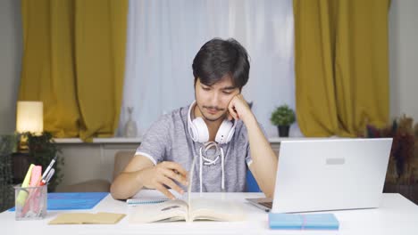 male student bored with studying.