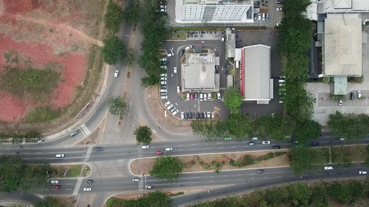 Aerial View of a City Intersection with Buildings and a Restaurant