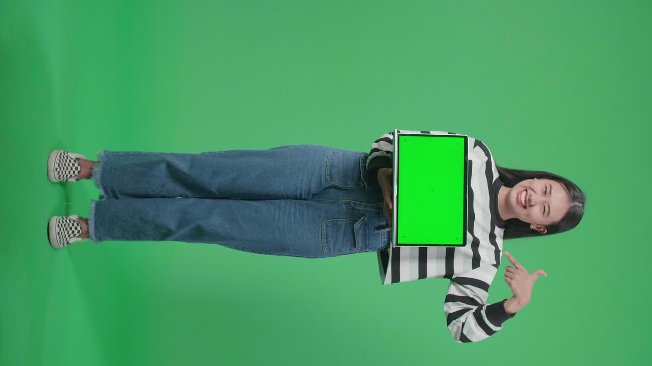 Woman Showing Laptop with Green Screen