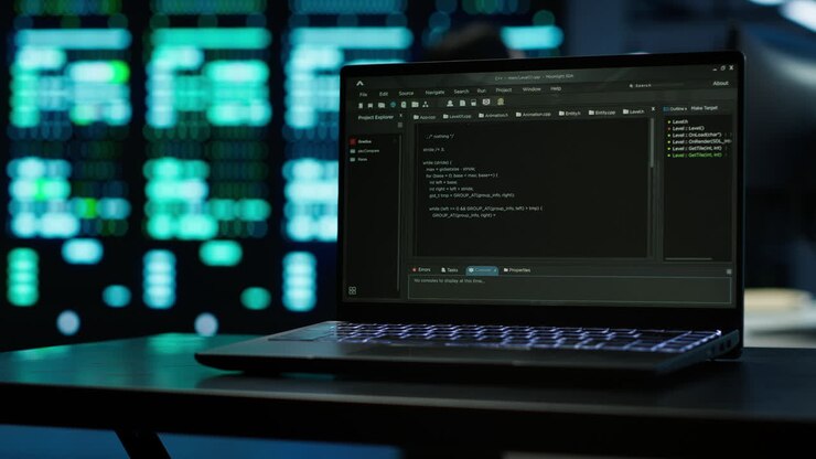 Close up of code running on laptop screen in data center