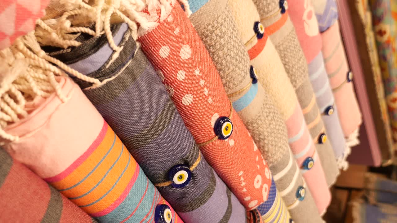 Rolled Turkish Towels with Evil Eye Beads