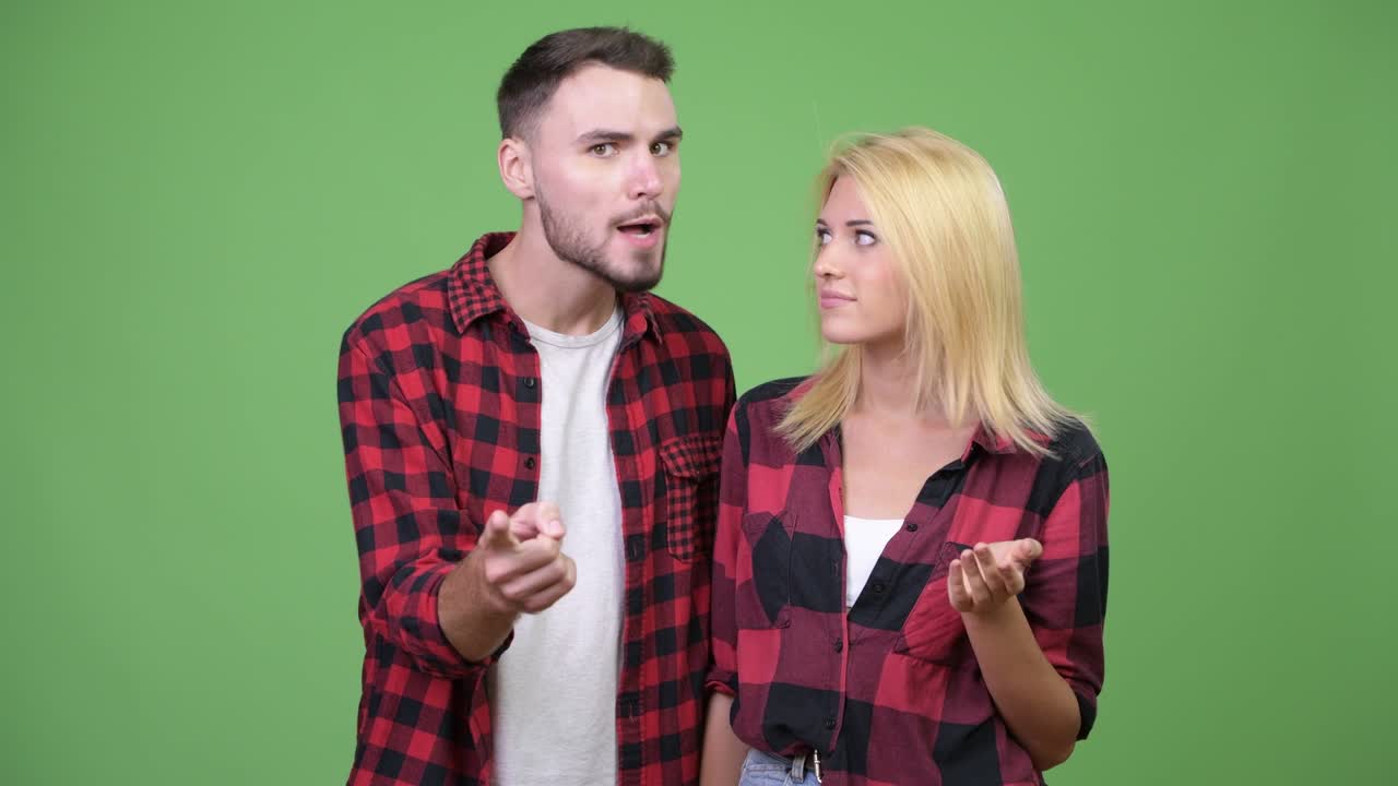 Young man being angry together with young woman