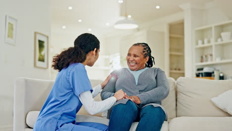 Helping-hand,-old-woman-and-caregiver-on-sofa