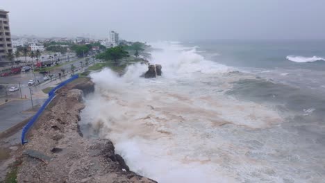 hurricane beryl - powerful swell hitting rocky coast of dominican republic