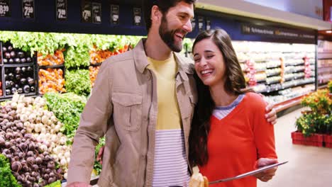 couple embracing each other in organic section