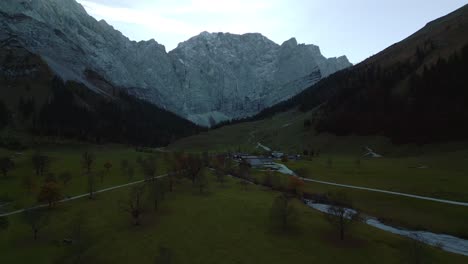 Austrian-Bavarian-alps-mountain-peaks-with-romantic-and-scenic-green-grass-meadows-and-maple-trees-in-natural-landscape