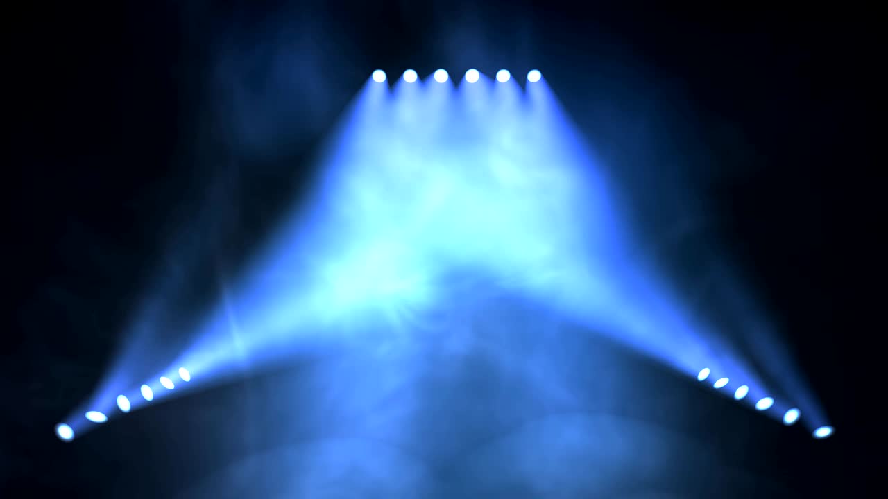 Stage lights shining at studio. Seamless looping animation.
