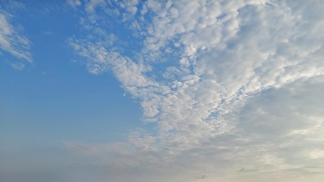 Clouds at sunset, 4k timelapse video of a cloudscape