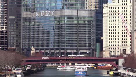 an establishing shot of the trump hotel in the downtown chicago loop