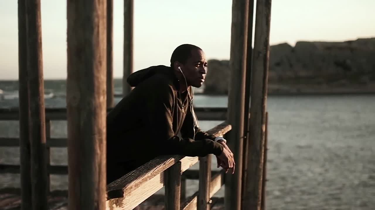 Man enjoying the view while standing on the promenade