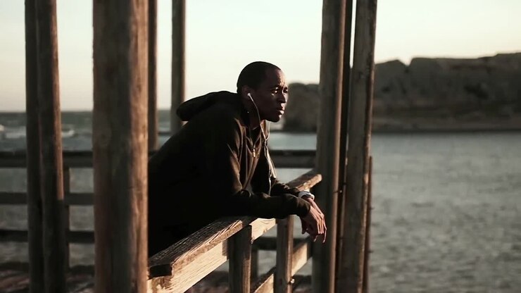 Man enjoying the view while standing on the promenade