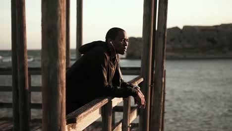 man enjoying the view while standing on the promenade