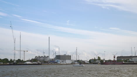 Boat-sailing-in-city-harbour