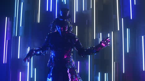 steel female in a sparkling reflective suit. neon light blue-violet light. show dancer.