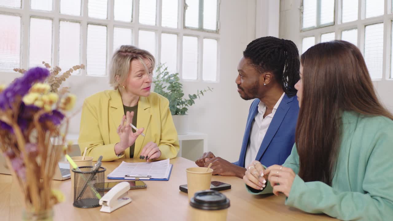 Business meeting with diverse team in office