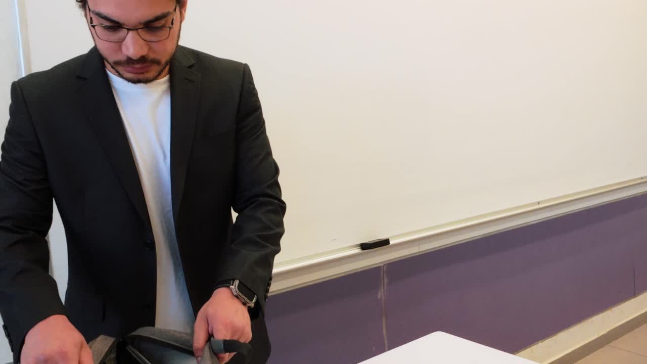 Male Lecturer in Modern Classroom Setting