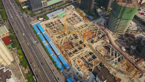 china day time shanghai city traffic road side construction aerial top view 4k