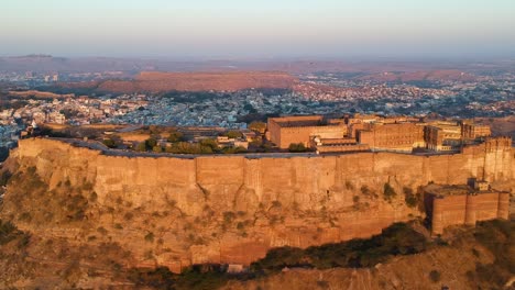 golden hour aerial view of mehrangarh fort at sunrise