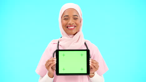 Woman,-doctor-and-tablet-green-screen-in-studio