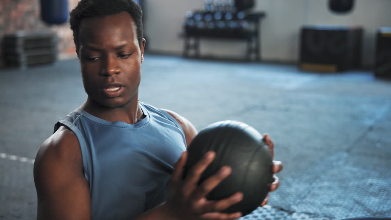 Fitness, gym and black man on floor with medicine