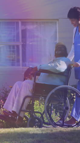 animation of light moving over nurse wheeling senior man in wheelchair