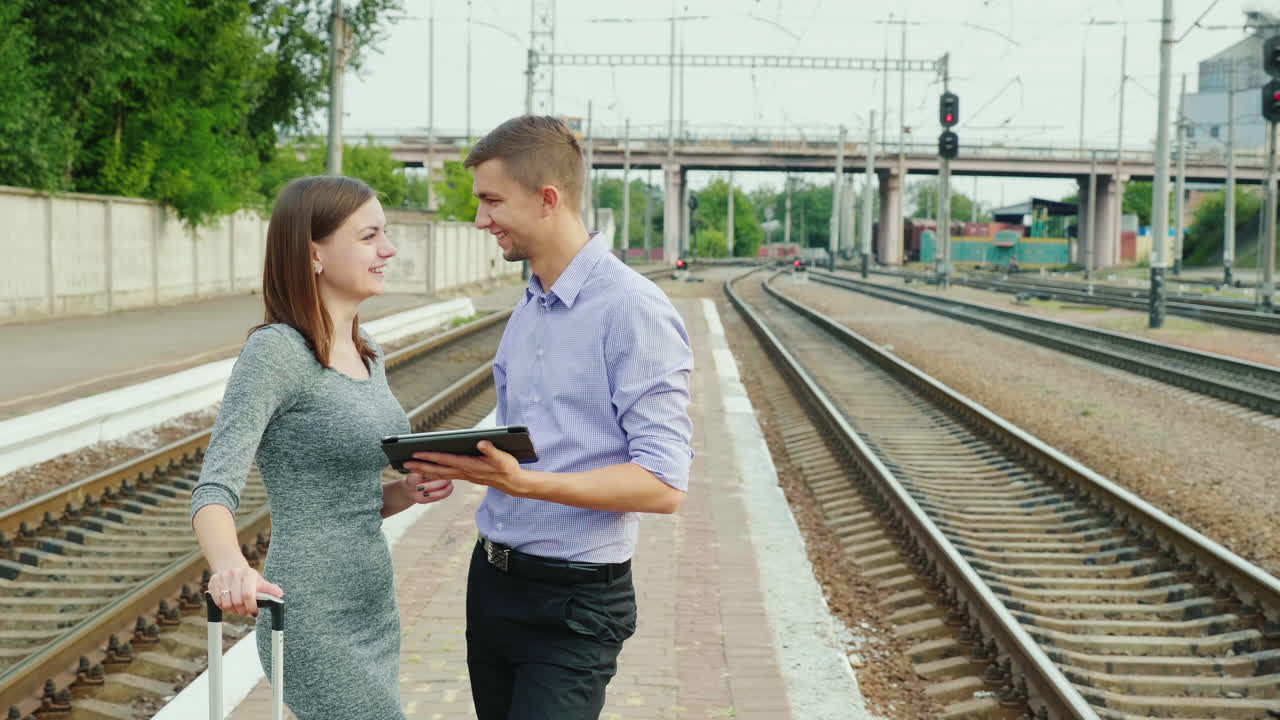 Young People Waiting For The Train