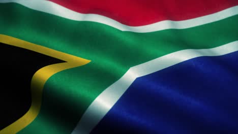 la bandera de sudáfrica ondeando en el viento. la bandera nacional de sudáfrica. el signo de sudáfrica animación de bucle sin costuras. 4k