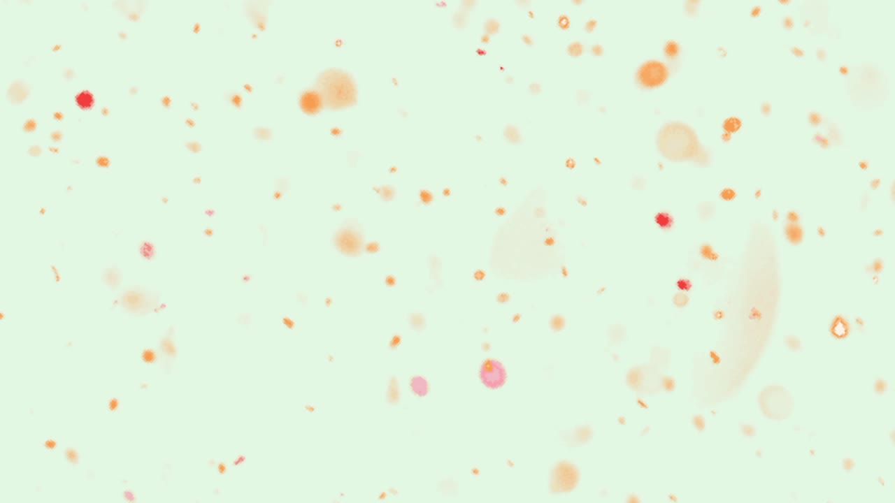 Multiple glowing spheres of different sizes move chaotically in all directions, appearing and disappearing over a white background.