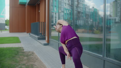 woman practicing yoga outdoors