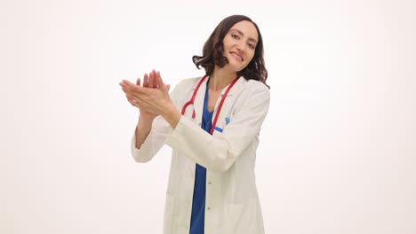 female doctor shrugging and clapping on white background
