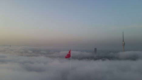 turkish flag on the fog camlica hill uskudar