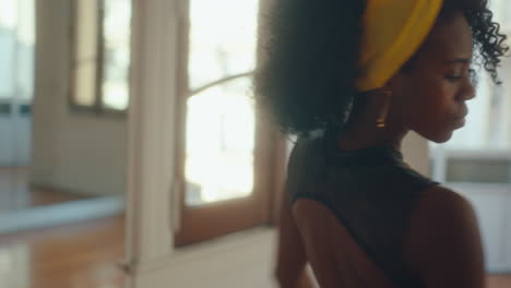 stunning black woman dancing tango and posing on camera in studio