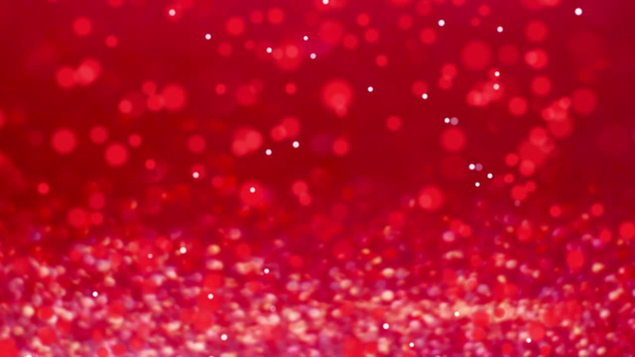 Red shiny bokeh on a red background. animated background.