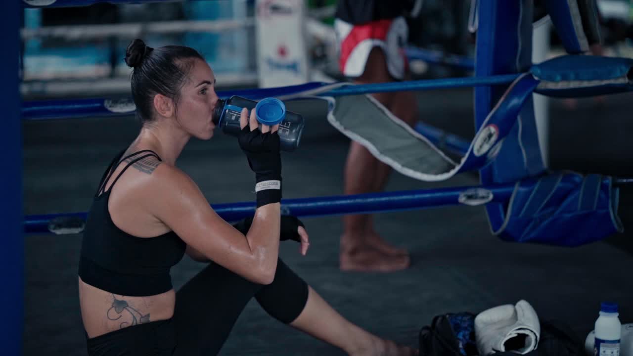 Female Fighter Taking a Break