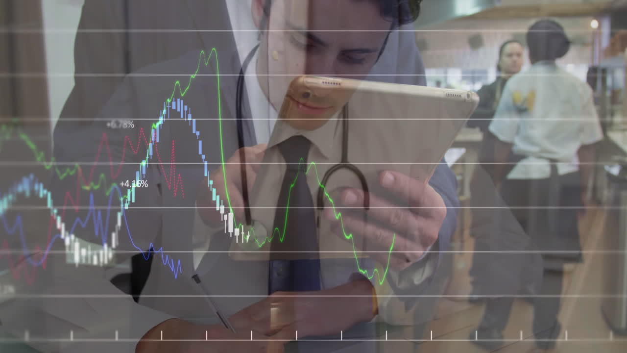 Doctor writing notes holding tablet while analyzing finance graph overlay on restaurant kitchen