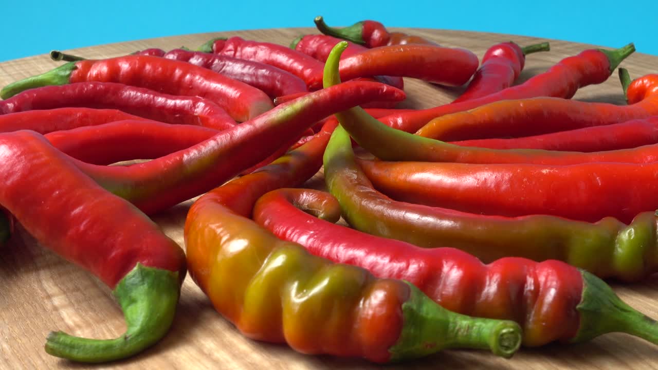 Red chilli, pepper. Shooting in the movement